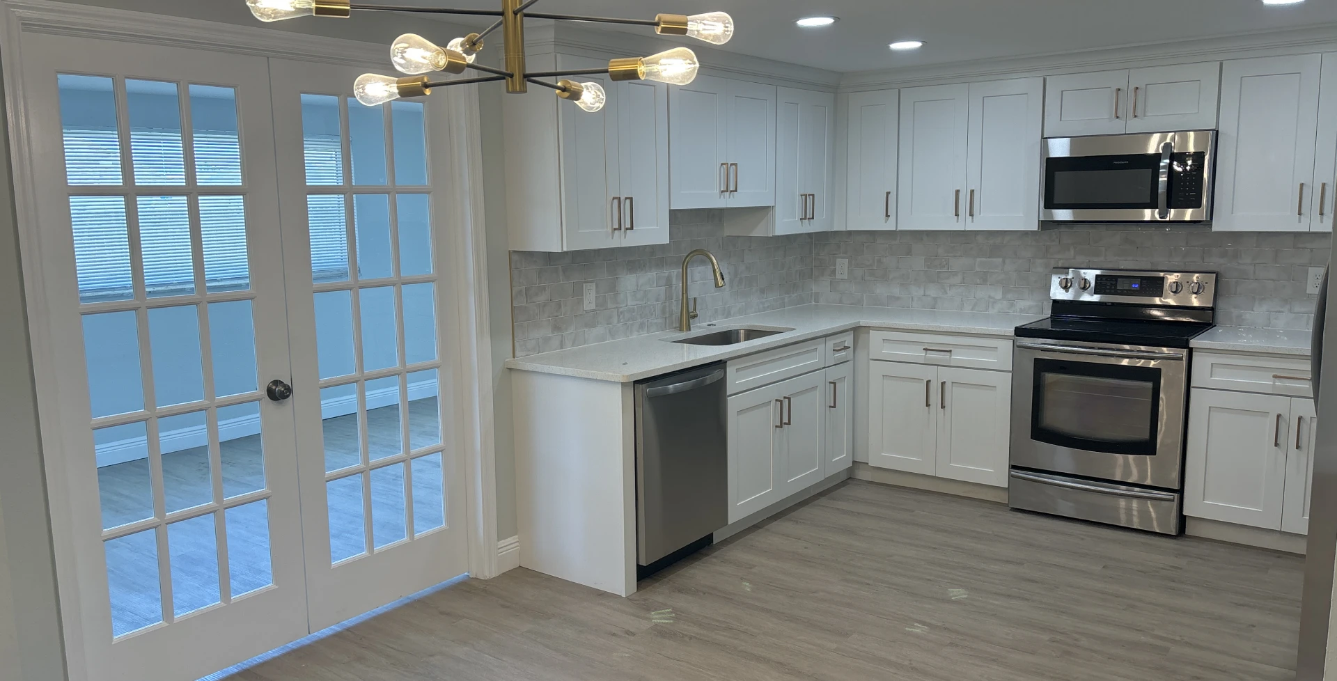 Modern kitchen with white cabinets